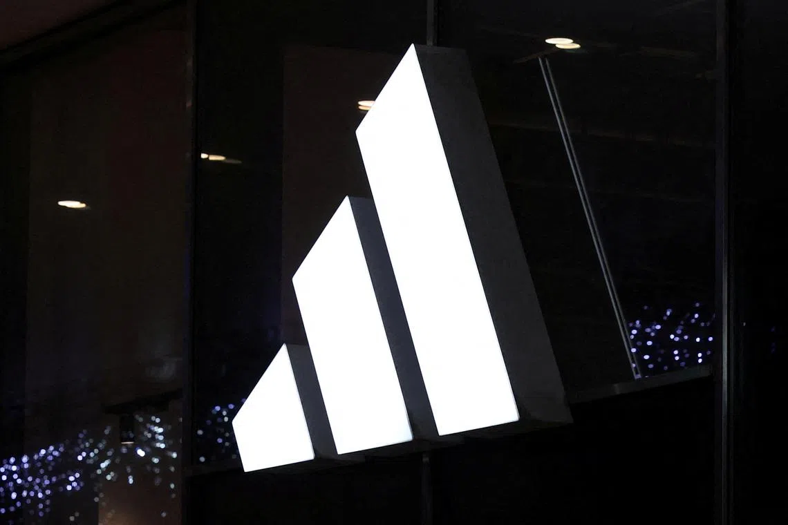 FILE PHOTO: Logo of Adidas brand is displayed on the store in the center of Warsaw, Poland, January 4, 2024. REUTERS/Kacper Pempel/File Photo
