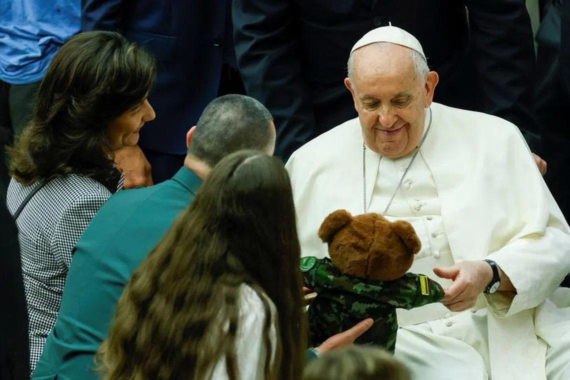 Pope Francis meets faithful during a weekly general audience in Paul VI hall, at the Vatican, August 30, 2023. REUTERS/Remo Casilli/File Photo