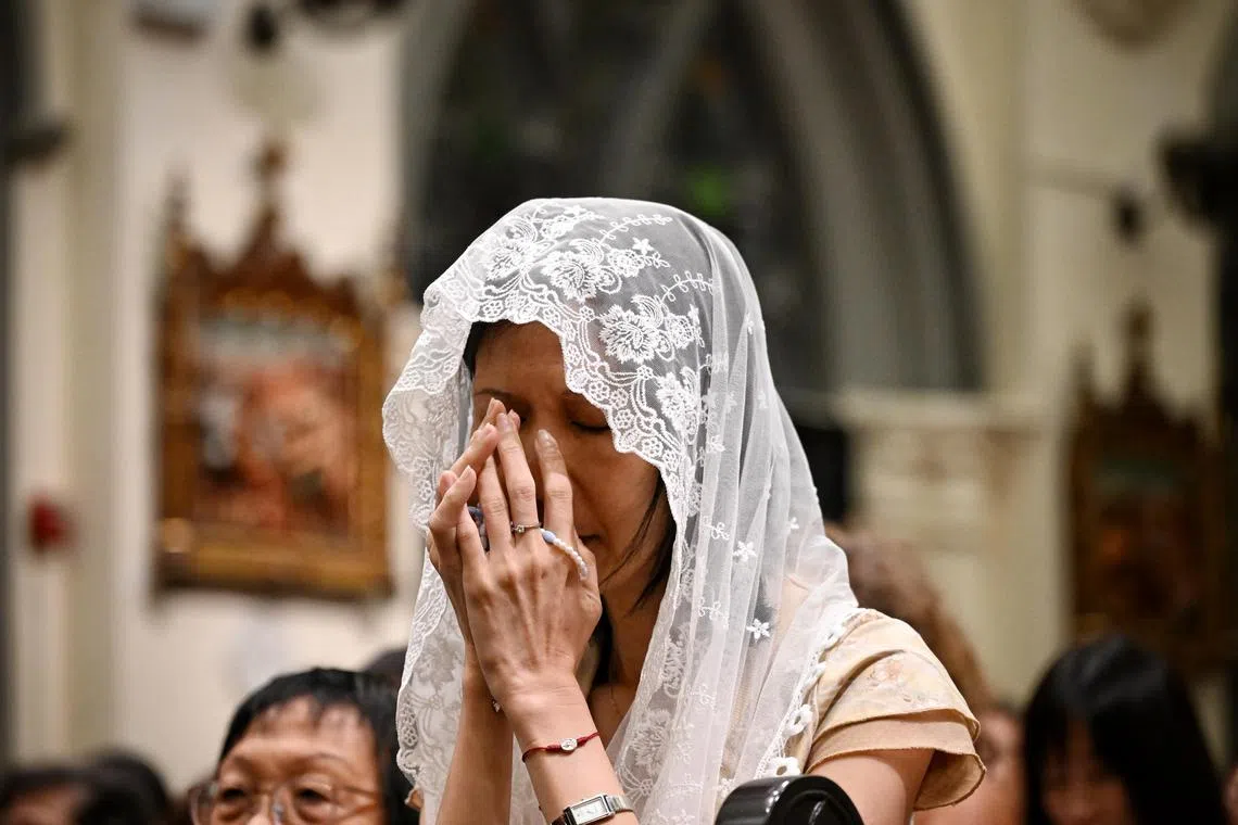 Worshippers during mass on Good Friday, the day Christians believe Jesus was crucified as a sacrifice to atone for mankind's sins, held at St. Joseph's Church at Victoria Street on March 29, 2024.