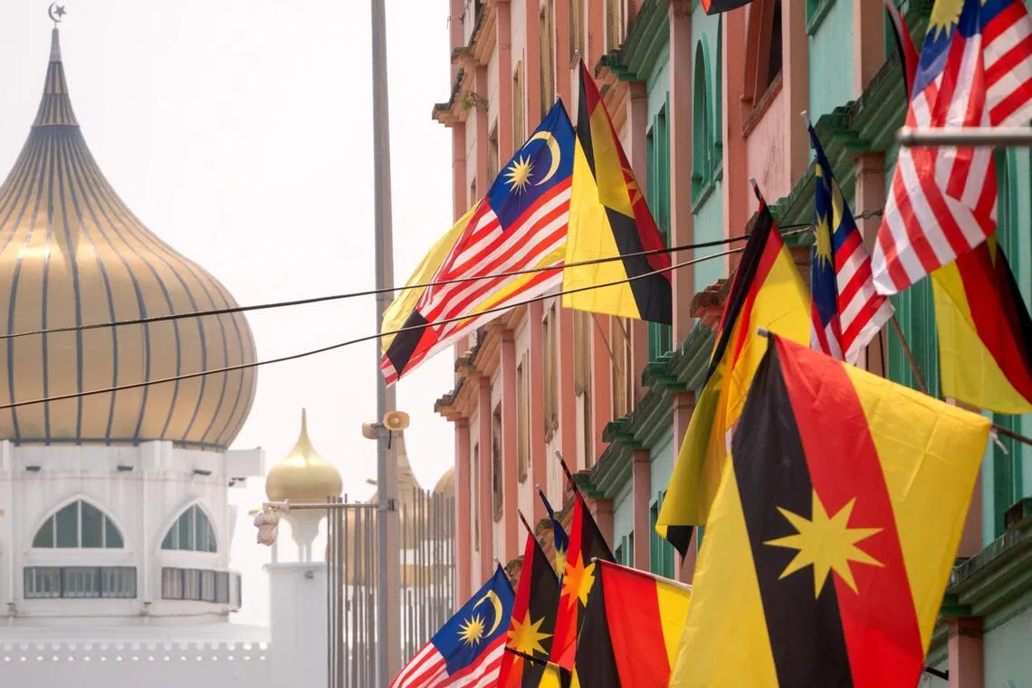 hasarawak - Sarawak flags seen along with Malaysian flags in the Kuching town.

(all credits ST PHOTO: HADI AZMI unless stated otherwise)