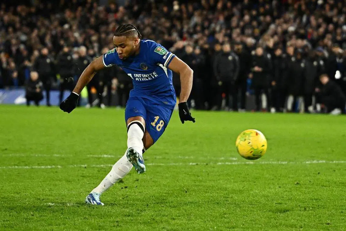 FILE PHOTO: Soccer Football - Carabao Cup - Quarter Final - Chelsea v Newcastle United - Stamford Bridge, London, Britain - December 19, 2023 Chelsea's Christopher Nkunku scores a penalty during a penalty shootout REUTERS/Dylan Martinez /File Photo