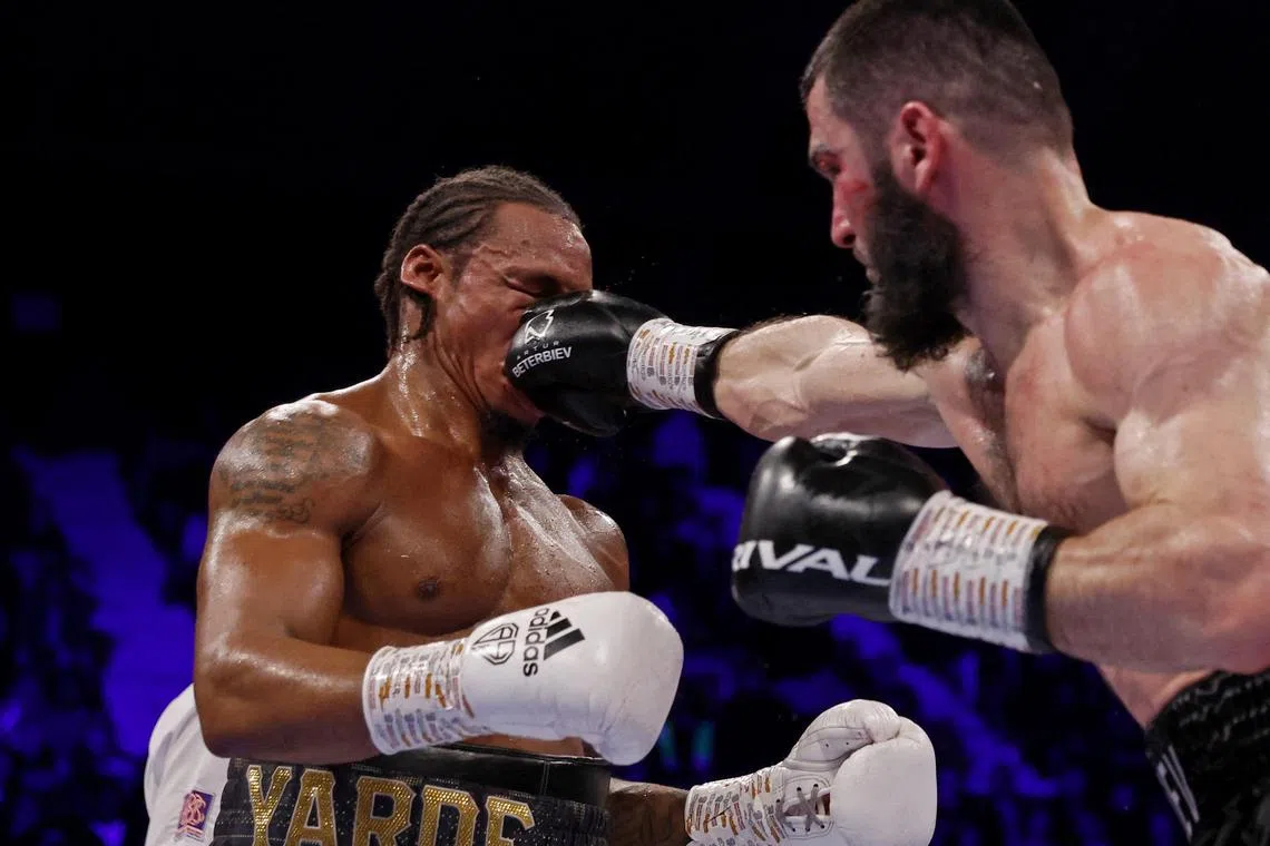 Artur Beterbiev throwing a punch at Anthony Yarde at London’s Wembley Arena on Saturday en route to retaining his WBC, IBF and WBO light-heavyweight belts.