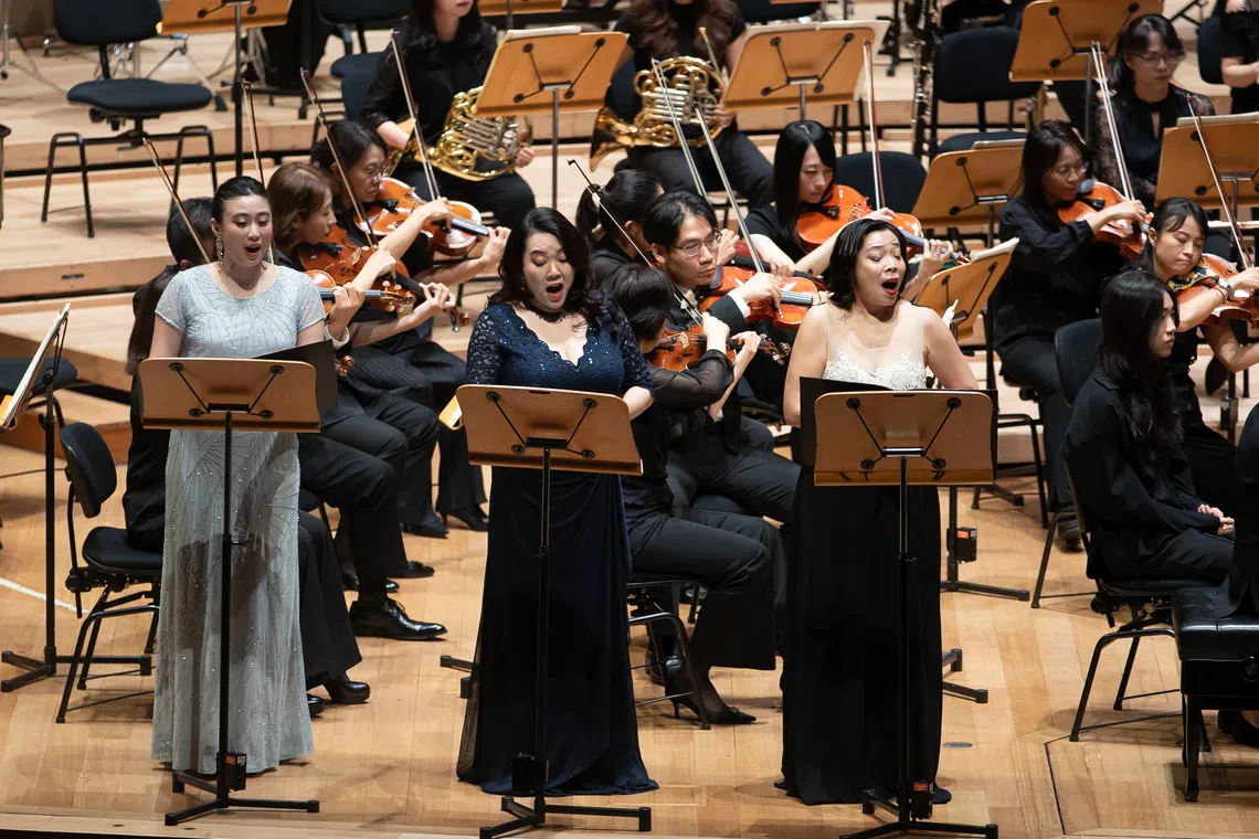 Singers Maggie Lu Pei Yun, Teng Xiang Ting and Joyce Tung Lee performing with the National Taiwan Symphony Orchestra.