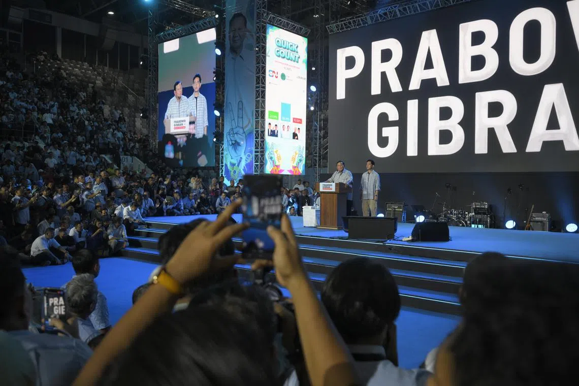 Indonesia’s incoming President Prabowo Subianto (left) and incoming vice-president Gibran Rakabuming Raka at a watch party in Jakarta on Feb 14.
