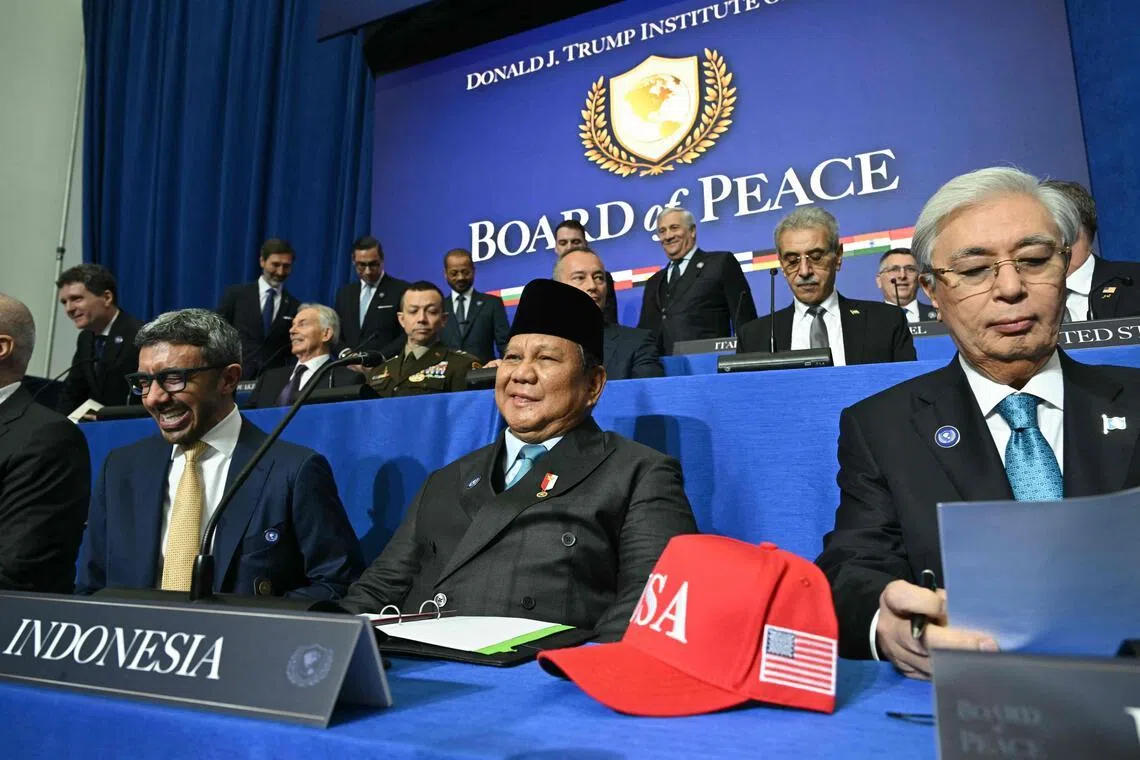 Indonesia's President Prabowo Subianto (front C) and Kazakhstan's President Kassym-Jomart Tokayev (front R) attend the inaugural meeting of the Board of Peace in Washington, DC, on Feb 19, 2026.  PHOTO: AFP