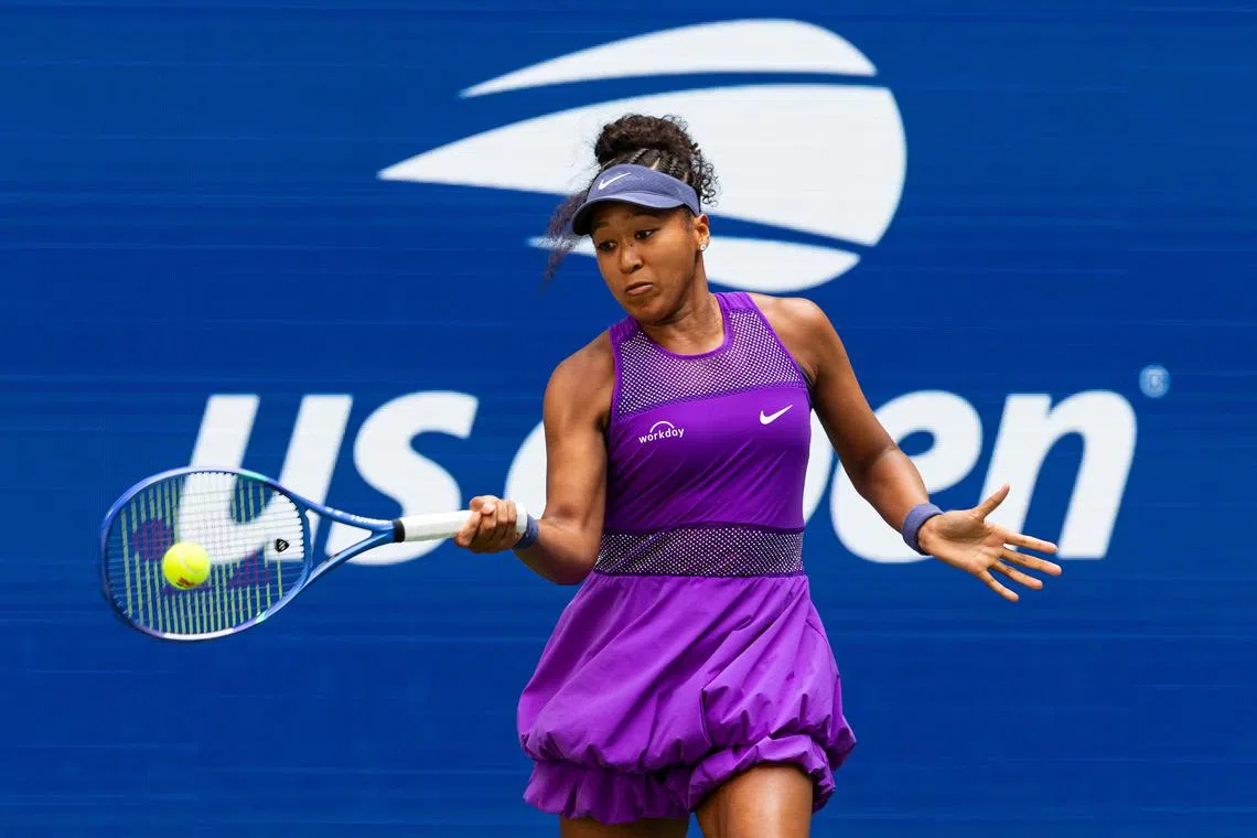 Sep 1, 2025; Flushing, NY, USA; Naomi Osaka of Japan in action against Coco Gauff of the United States in the fourth round of the women’s singles at the US Open at Arthur Ashe Stadium in Billie Jean King National Tennis Center. Mandatory Credit: Mike Frey-Imagn Images