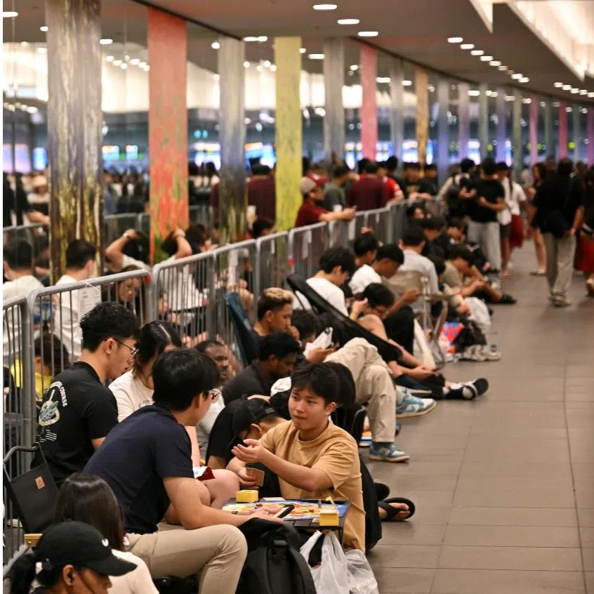 The queue (left) for the Audemars Piguet x Swatch release near Bayfront MRT Station at 8pm on May 15.
