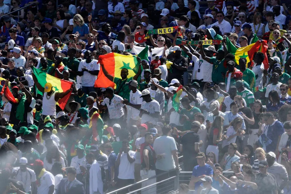 Immigrants, international fans step up with Senegal supporters stuck at home