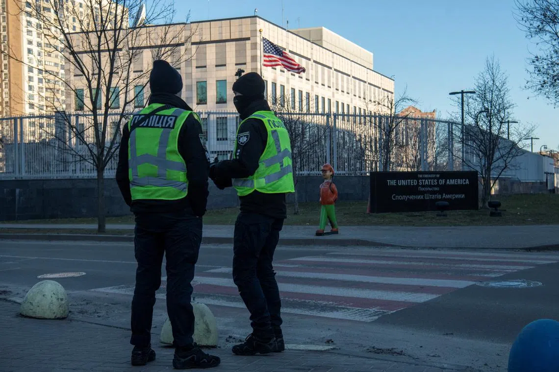 FILE PHOTO: Police officers stand outside the U.S. embassy, amid Russia's attack on Ukraine, in Kyiv, Ukraine February 20, 2023. REUTERS/Vladyslav Musiienko/File Photo