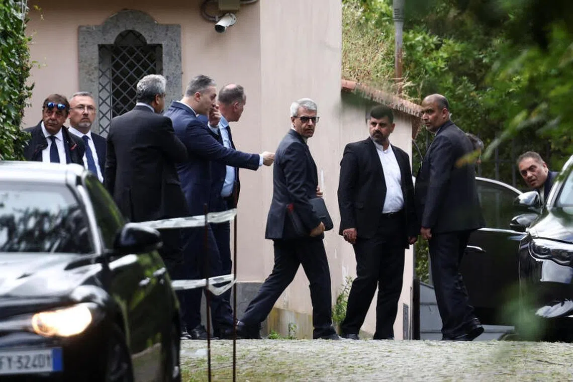 Members of the Iranian delegation leave the Omani embassy, where the fifth round of U.S.-Iran talks takes place, in Rome, Italy, May 23, 2025. REUTERS/Guglielmo Mangiapane