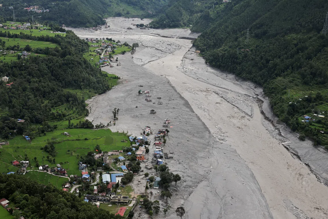 An aerial view shows widespread destruction following the deadly flash floods and mudslides along Nuwakot Trishuli River, in Nuwakot district, Nepal, September 3, 2026. REUTERS/Navesh Chitrakar