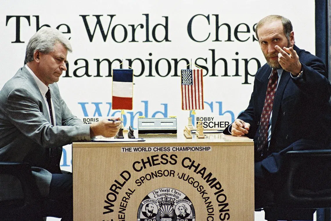 FILE PHOTO: Former world chess champion Bobby Fischer (R) gestures during his match against his archrival Boris Spassky of the Soviet Union, in the Yugoslav resort of Sveti Stefan in this September 1992 file photo . REUTERS/Ivan Milutinovic/File Photo