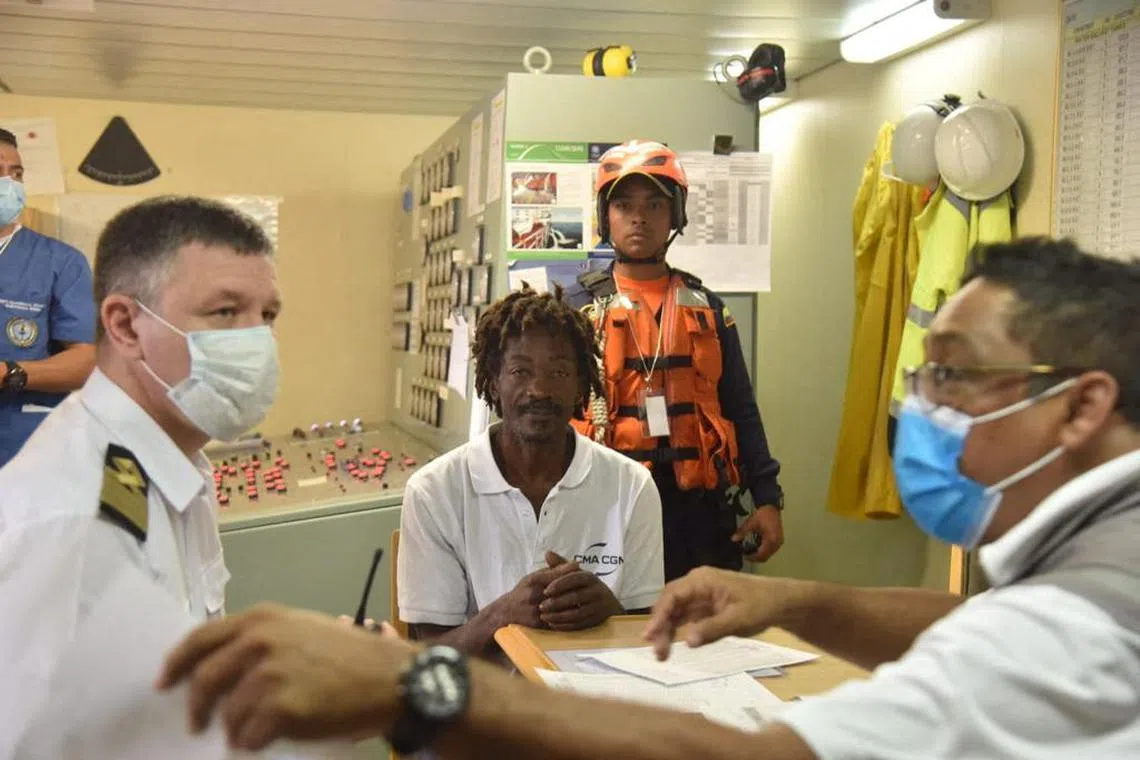 This undated handout picture released on January 18, 2023 by the Colombian National Navy shows Dominican Elvis Fracois being checked after his rescue on the caribbean sea in Colombia. - A Dominican man was lost for almost a month aboard a sailboat in the Caribbean Sea and survived eating ketchup before being rescued in Colombian waters, the country's naval authority reported Wednesday. (Photo by Colombian National Navy / AFP) / RESTRICTED TO EDITORIAL USE - MANDATORY CREDIT "AFP PHOTO / COLOMBIAN NATIONAL NAVY" - NO MARKETING NO ADVERTISING CAMPAIGNS - DISTRIBUTED AS A SERVICE TO CLIENTS