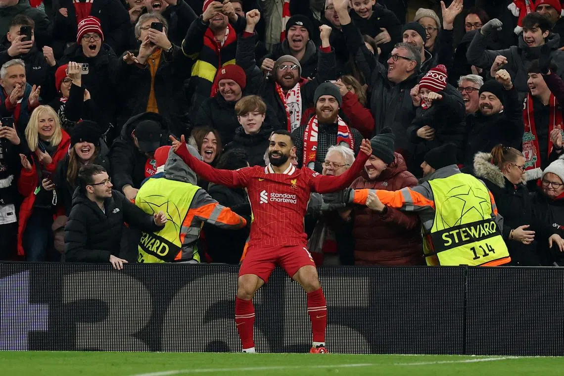 Soccer Football - Champions League - Liverpool v Lille - Anfield, Liverpool, Britain - January 21, 2025
Liverpool's Mohamed Salah celebrates scoring their first goal with fans Action Images via Reuters/Lee Smith     TPX IMAGES OF THE DAY     