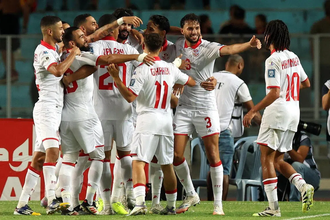 Tunisia players celebrating a goal in the 3-0 win over Liberia in their World Cup qualifier at Rades stadium in Tunis on Sept 4, 2025.