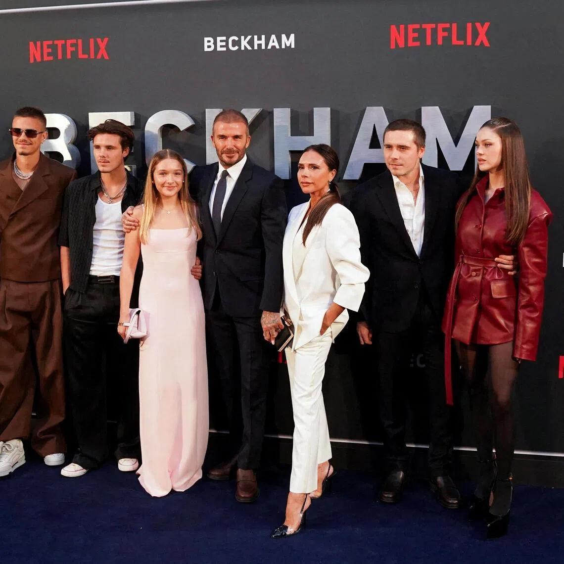 The Beckham family (from right): Nicola Peltz, Brooklyn Beckham, Victoria Beckham, David Beckham, Harper Beckham, Cruz Beckham, Romeo Beckham and his then girlfriend Mia Regan on Oct 3, 2023.