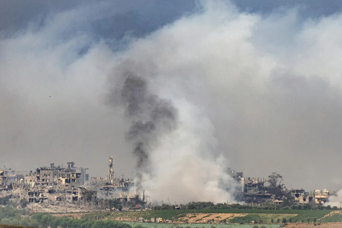 Smoke rises from northern Gaza after an Israeli airstrike on Oct 29, 2023. 