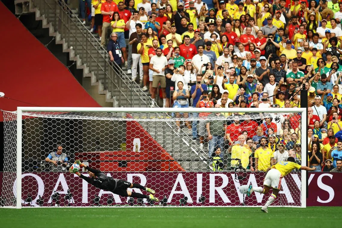 Soccer Football - FIFA World Cup 2026 - Round of 16 - Switzerland v Colombia - BC Place, Vancouver, Canada - July 7, 2026 Colombia's Cucho Hernandez has his penalty saved by Switzerland's Gregor Kobel during the penalty shootout REUTERS/Albert Gea
