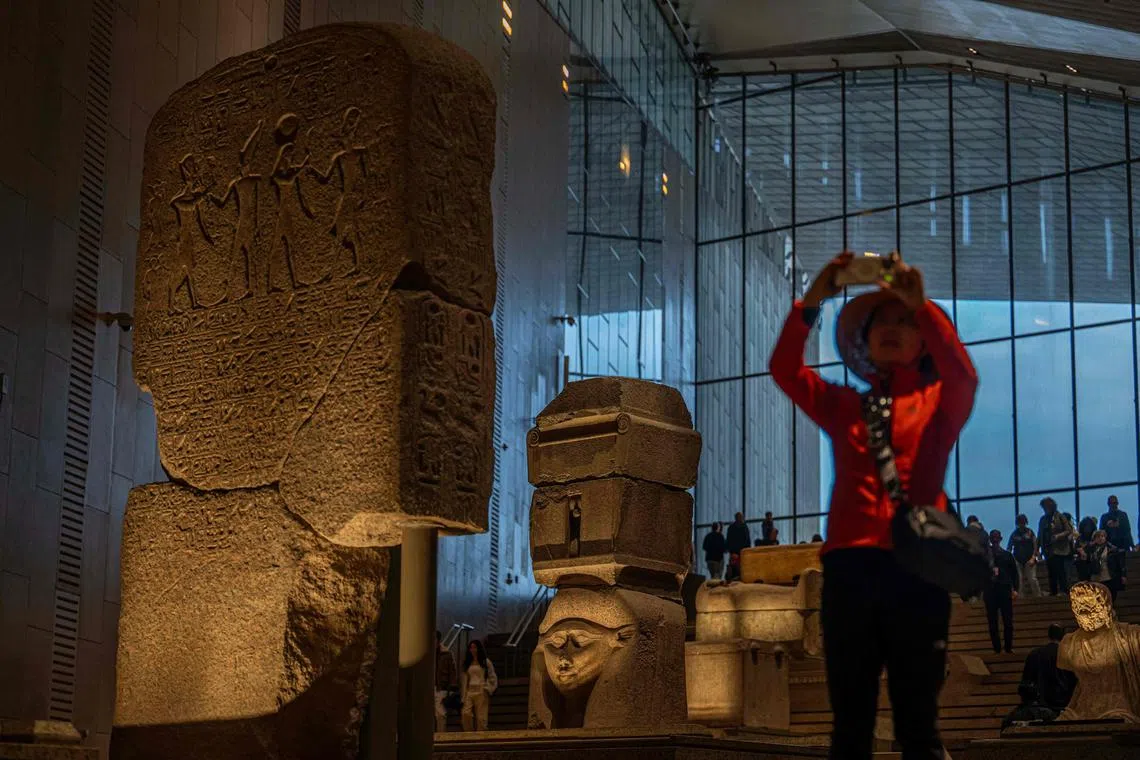 A visitor tours the Grand Egyptian Museum, in Giza on the southwestern outskirts of the capital Cairo on Feb 7, 2025.