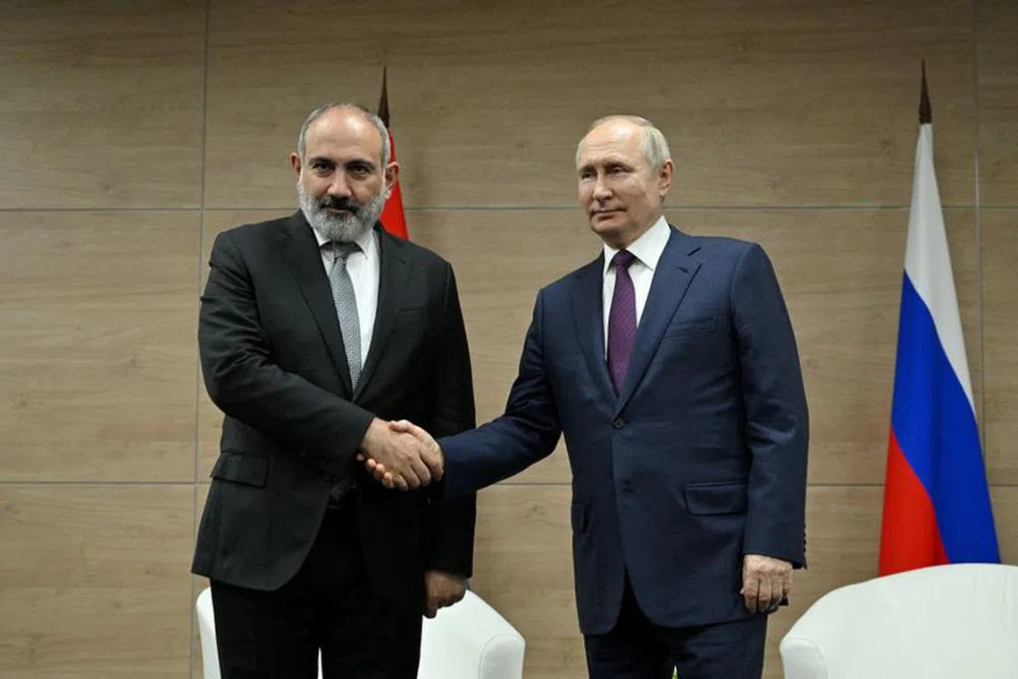 FILE PHOTO: Russian President Vladimir Putin meets with Armenian Prime Minister Nikol Pashinyan in Sochi, Russia June 9, 2023. Host photo agency/Ramil Sitdikov via REUTERS/File Photo