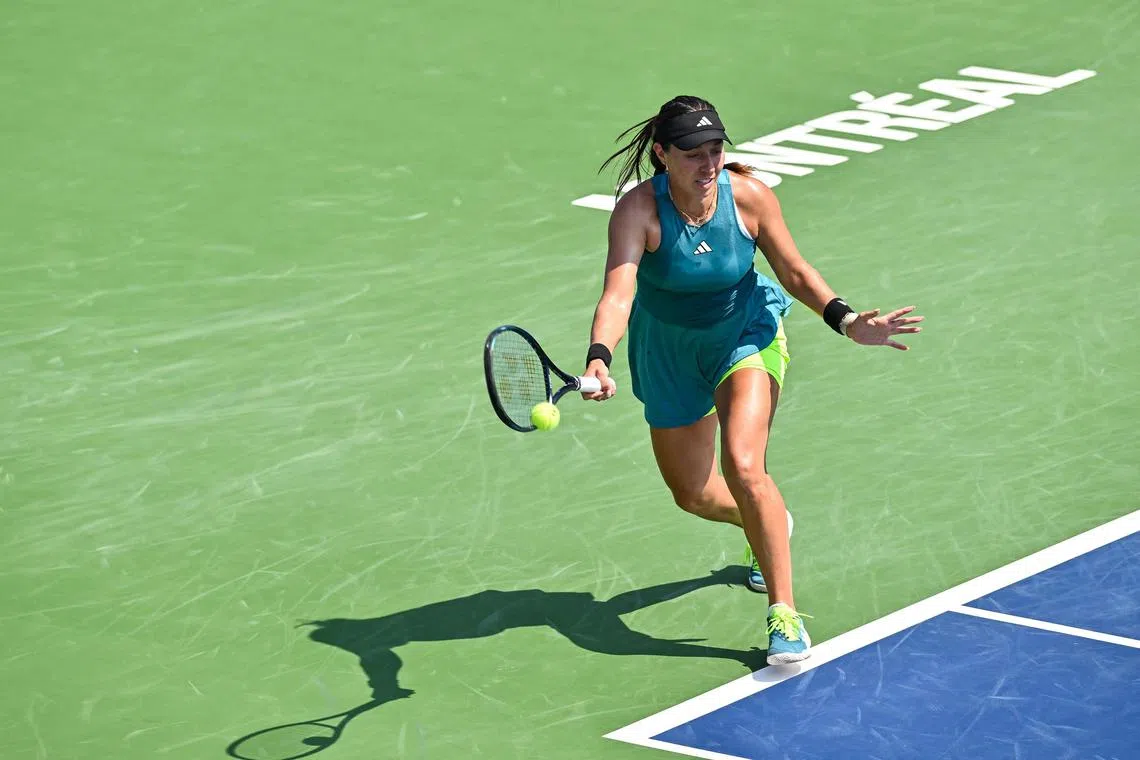 Fourth-seed Jessica Pegula hits a return against Jasmine Paolini of Italy.