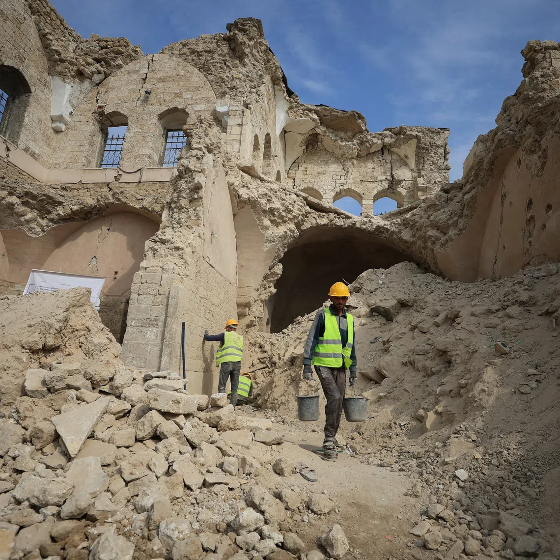 Workers carry out restoration work at the historical Al-Basha Palace, damaged during the war, in Gaza City, November 13, 2025. REUTERS/Dawoud Abu Alkas