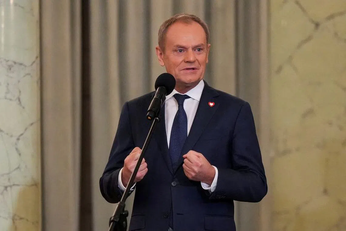 Newly appointed Polish Prime Minister Donald Tusk speaks as he attends the cabinet swearing-in ceremony at the Presidential Palace in Warsaw, Poland December 13, 2023. REUTERS/Aleksandra Szmigiel/File Photo