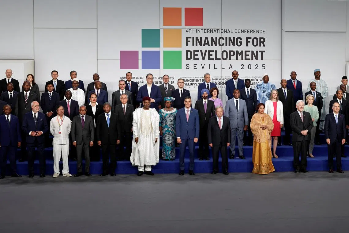Spanish Prime Minister Pedro Sanchez, UN Secretary-General Antonio Guterres and other authorities pose for a family photo during the opening ceremony of the 4th International Conference on Financing for Development, in Seville, Spain, June 30, 2025. REUTERS/Jon Nazca