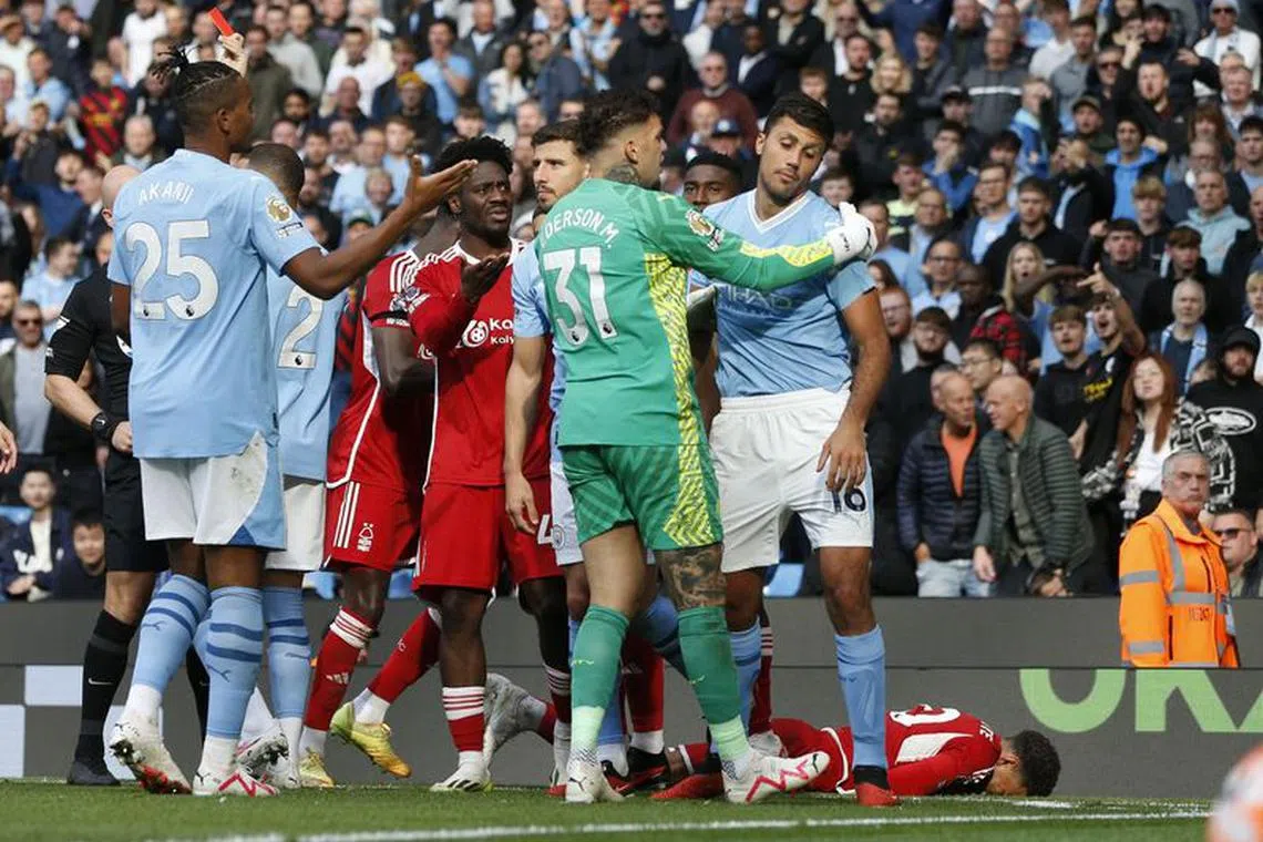 Soccer Football - Premier League - Manchester City v Nottingham Forest - Etihad Stadium, Manchester, Britain - September 23, 2023 Manchester City's Rodri reacts after being shown a red card by referee Anthony Taylor Action Images via Reuters/Ed Sykes