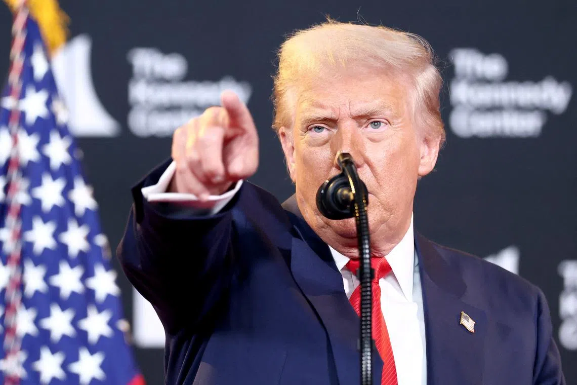 U.S. President Donald Trump takes a question from the press during a visit to the Kennedy Center in Washington, D.C., U.S., August 13, 2025.  REUTERS/Kevin Lamarque