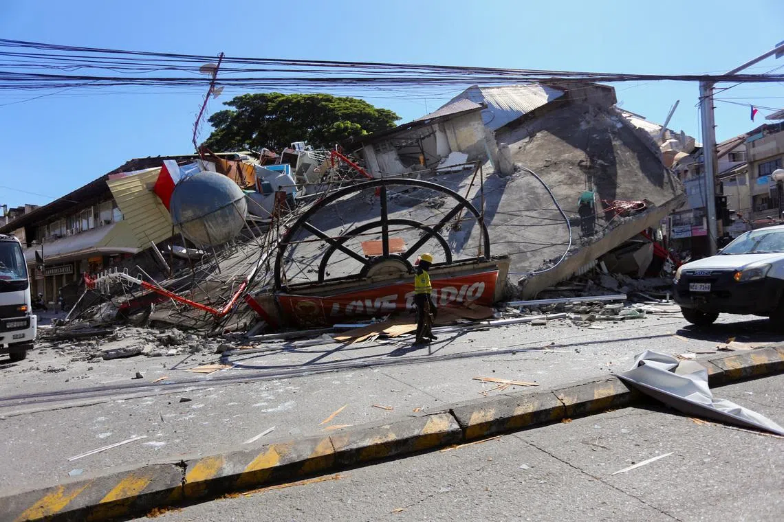 A collapsed building in General Santos, the Philippines, following a 7.8-magnitude earthquake on June 8.