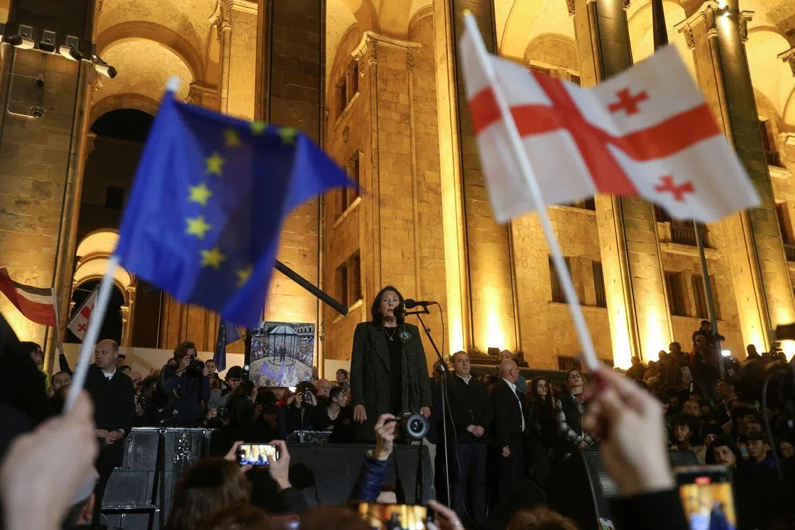 FILE PHOTO: Georgia's President Salome Zourabichvili addresses participants of a rally organized by supporters of opposition parties to protest against the result of a recent parliamentary election won by the ruling Georgian Dream party, in Tbilisi, Georgia October 28, 2024. REUTERS/Irakli Gedenidze/File Photo