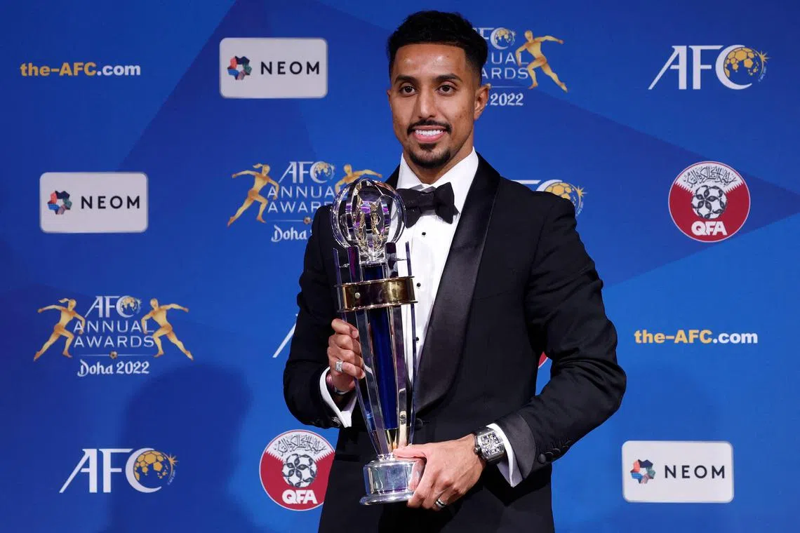Saudi Arabia forward Salem Al-Dawsari with the AFC Player of the Year award, after fighting off competition from Australia’s Mathew Leckie and Almoez Ali of Qatar.
