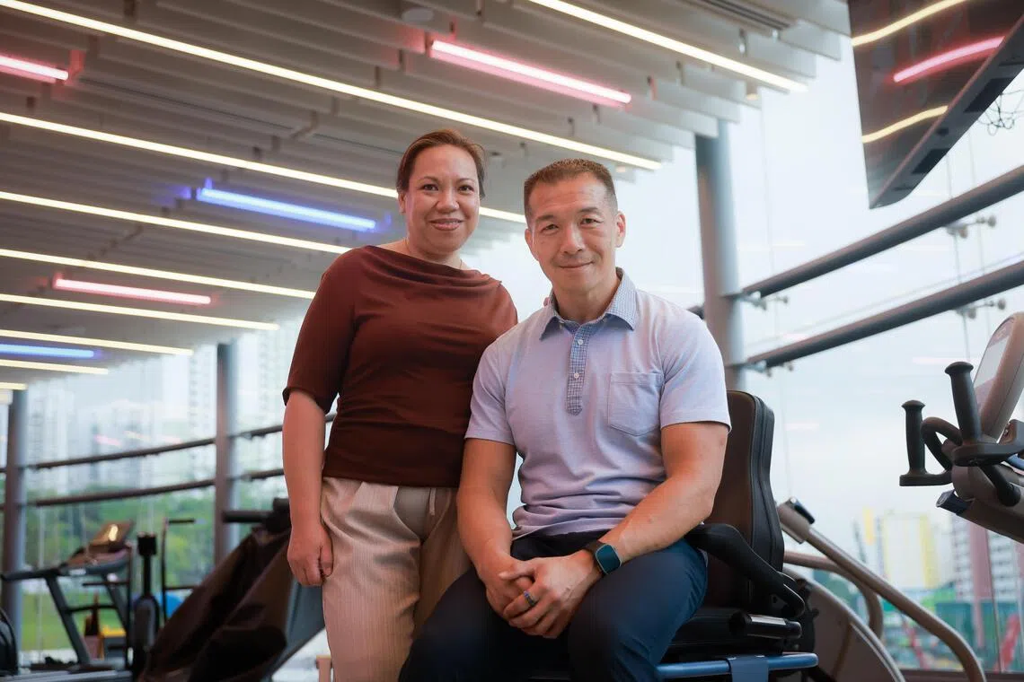 American Ninja Warrior Jimmy Choi and his wife, Cherryl, at a gym at AMK Hub on Oct 29. He was in Singapore to launch an interactive exhibition aimed at raising awareness of Parkinson’s disease.