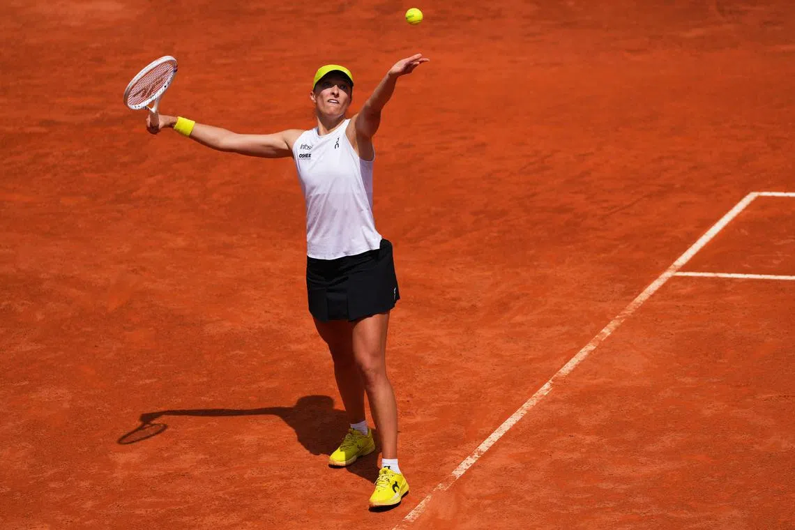 FILE PHOTO: Tennis - Italian Open - Foro Italico, Rome, Italy - May 10, 2025 Poland's Iga Swiatek in action during her round of 32 match against Danielle Collins of the U.S. REUTERS/Aleksandra Szmigiel/File Photo