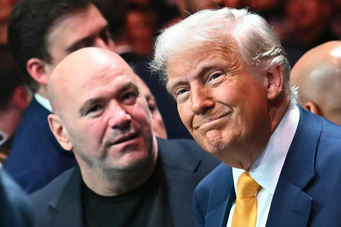 CEO and President of the Ultimate Fighting Championship (UFC) Dana White (L) and US President Donald Trump attend UFC 314 at the Kaseya Center in Miami, Florida, on April 12.