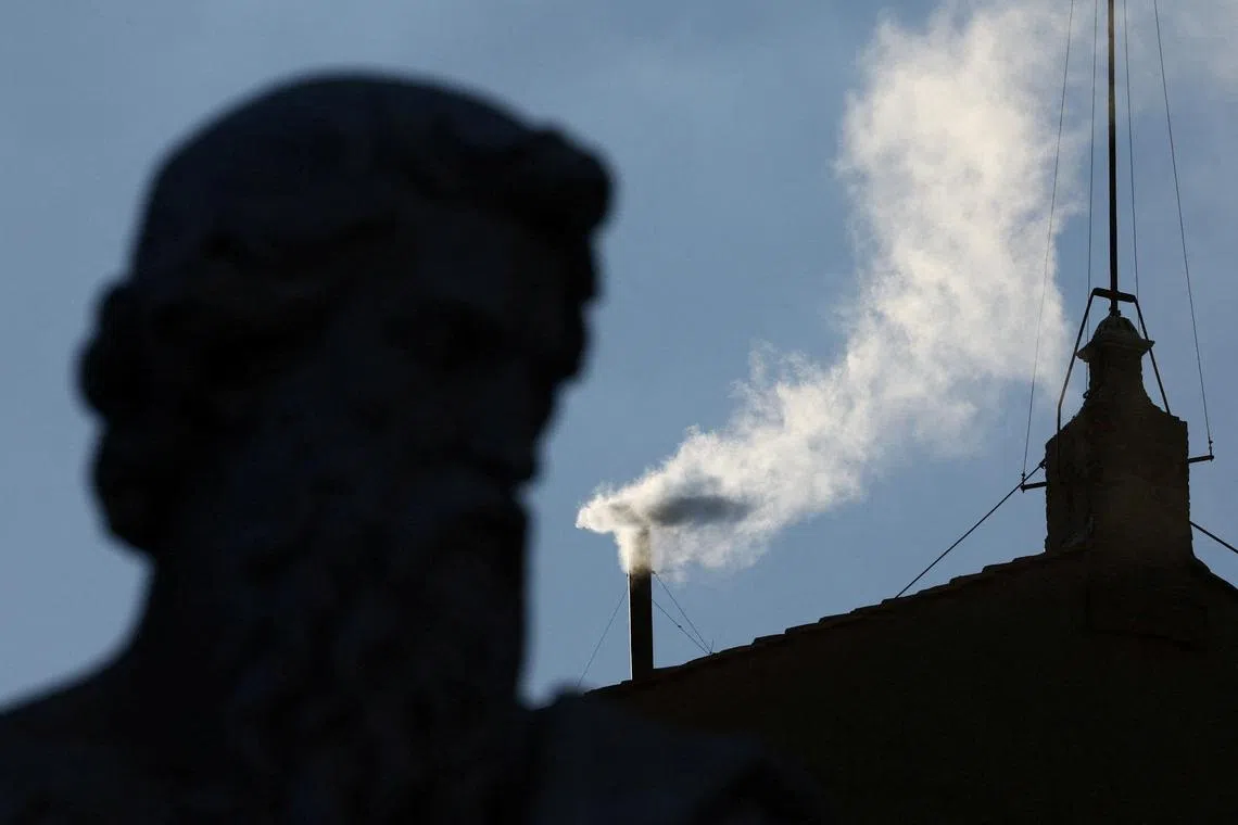White smoke rising from the chimney of the Sistine Chapel, signalling the election of a new pope at the Vatican on May 8.