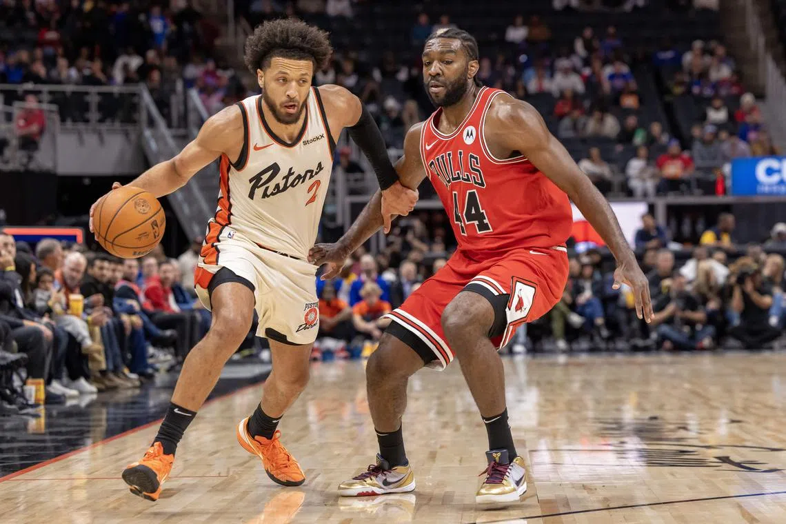 Nov 18, 2024; Detroit, Michigan, USA; Detroit Pistons guard Cade Cunningham (2) drives to the basket as Chicago Bulls forward Patrick Williams (44) defends during the first half at Little Caesars Arena. Mandatory Credit: David Reginek-Imagn Images/ File Photo