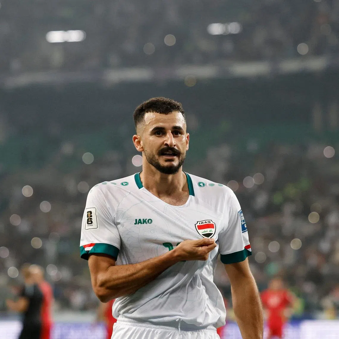 Soccer Football - World Cup - Asian Qualifiers - Third Round - Group B - Iraq v Palestine - Basra International Stadium, Basra, Iraq - October 10, 2024 Iraq's Aymen Hussein celebrates scoring their first goal REUTERS/Thaier Al-Sudani/File Photo