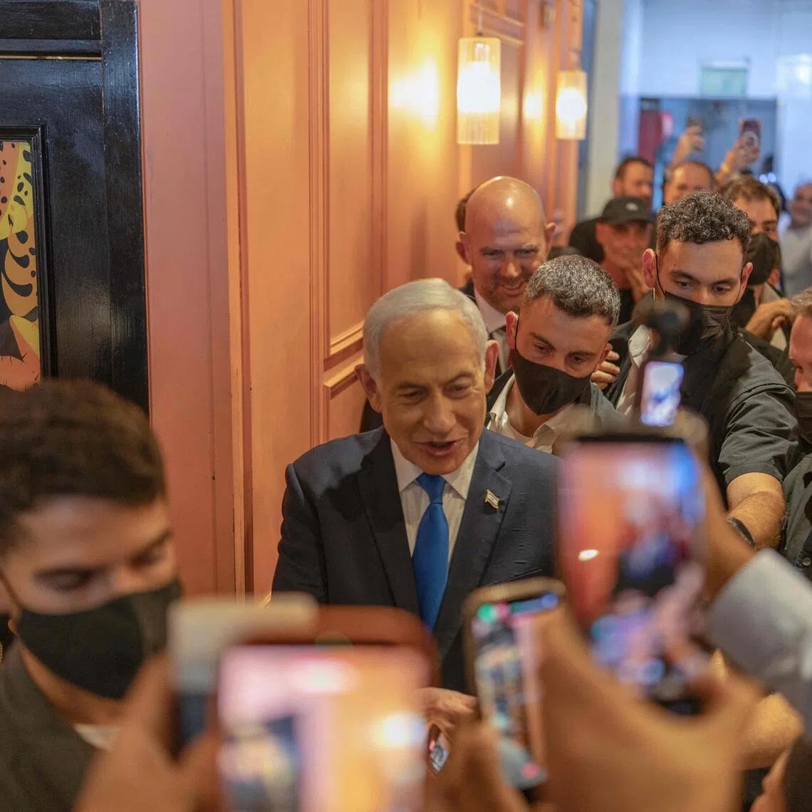 Israeli Prime Minister Benjamin Netanyahu (centre) interacting with supporters on Oct 21, during a Likud Party meet-and-greet in Dimona, Israel, ahead of the country’s legislative elections.