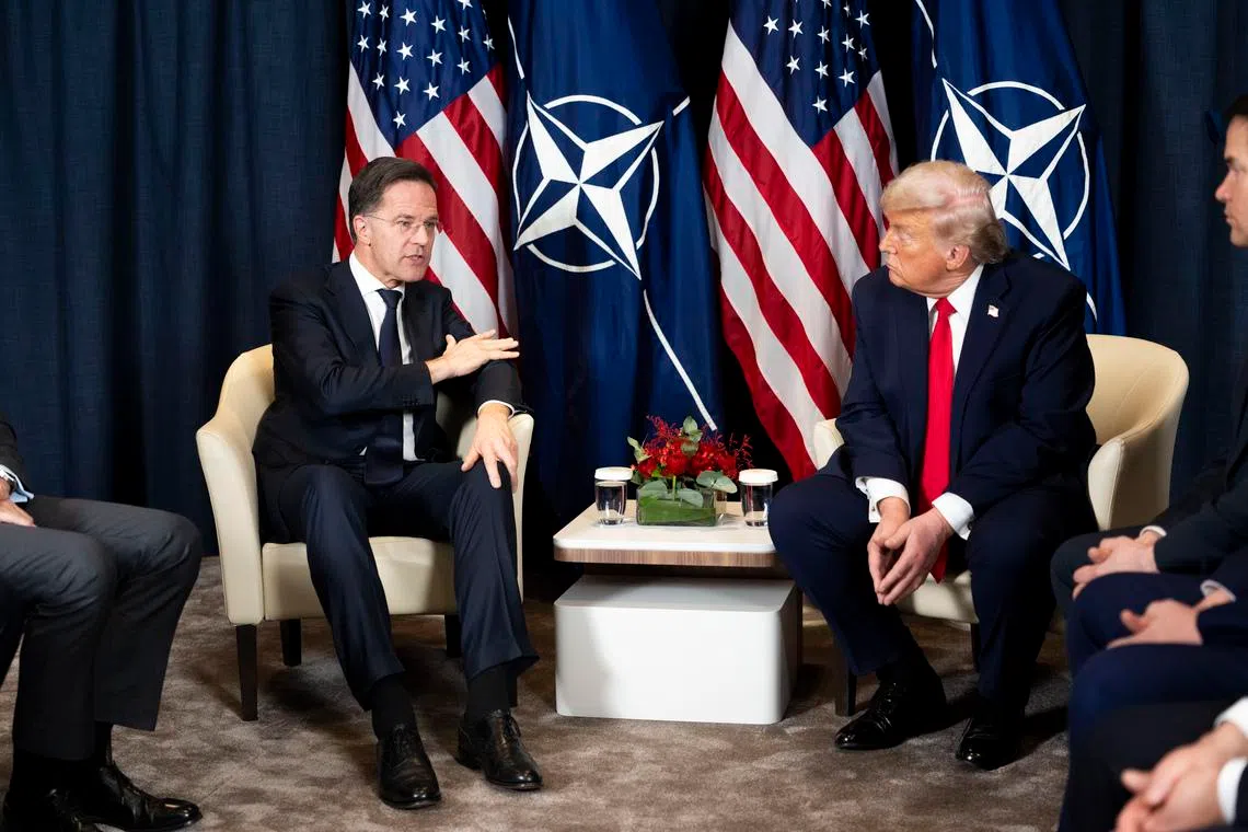 NATO Secretary-General Mark Rutte (left) speaks during a meeting with President Donald Trump on the sidelines of the WEF in Davos, Switzerland, on Jan 12.