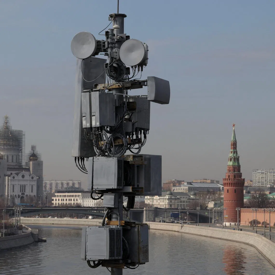 A view of a cellular tower with the Christ The Savior cathedral and the Kremlin's tower in the background in central Moscow, Russia March 27, 2026.