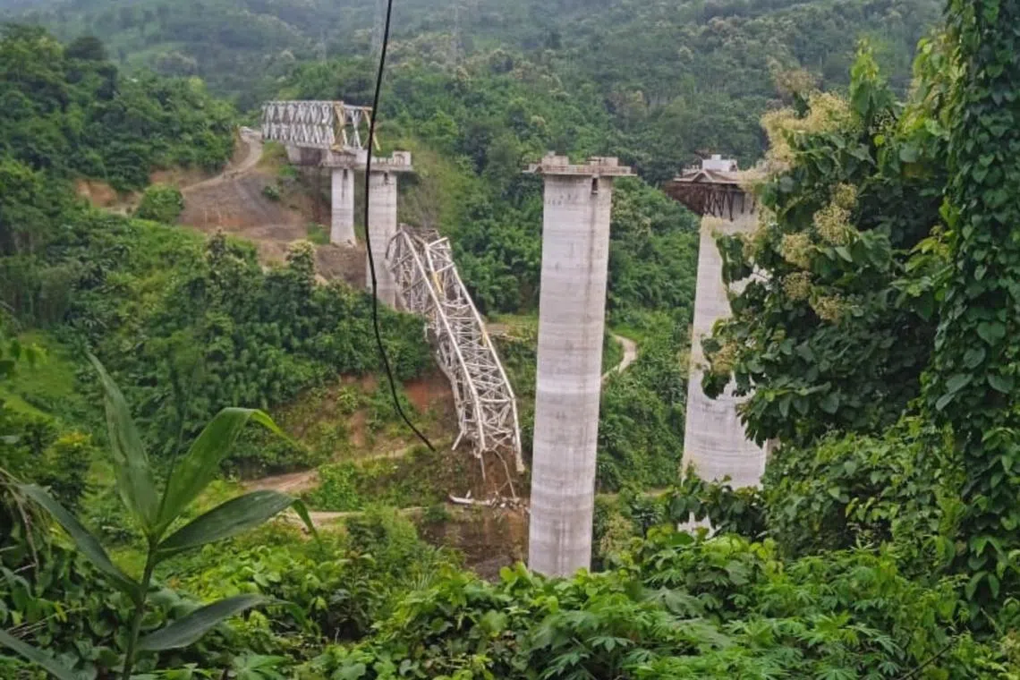 Video footage showed a metal frame that had toppled off towering columns into a wooded valley below.