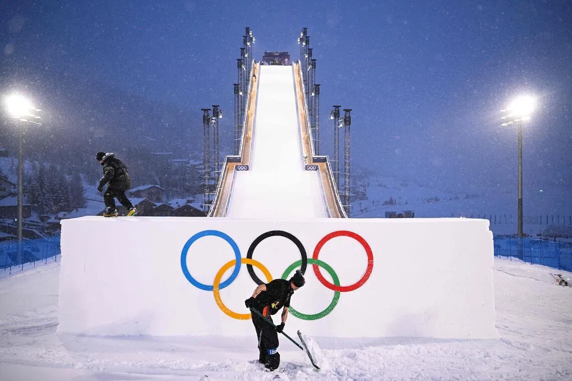 Workers preparing the venue ahead of the Winter Games' snowboarding events on Feb 4, in Livigno, Italy.