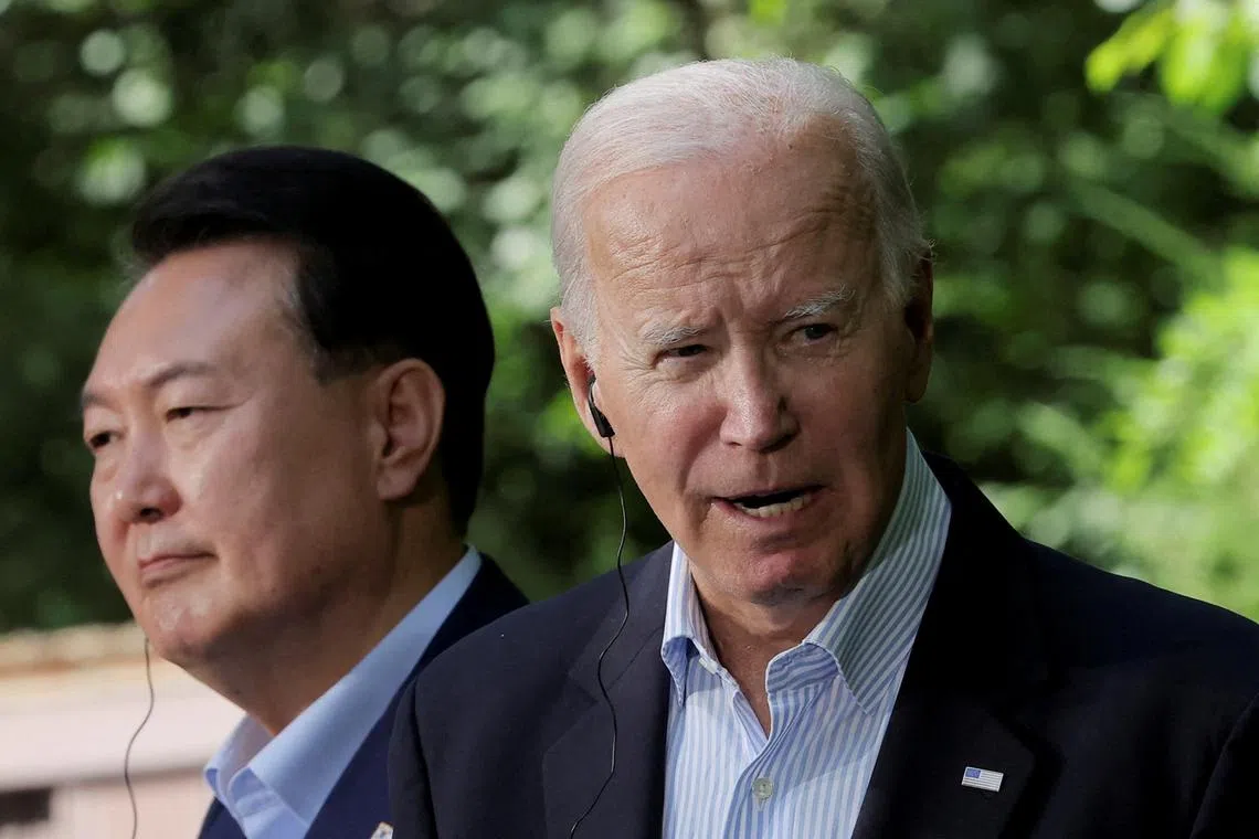 FILE PHOTO: U.S. President Joe Biden speaks at a joint press conference held with Japanese Prime Minister Fumio Kishida (not pictured) and South Korean President Yoon Suk Yeol during the trilateral summit at Camp David near Thurmont, Maryland, U.S., August 18, 2023. REUTERS/Jim Bourg/File Photo