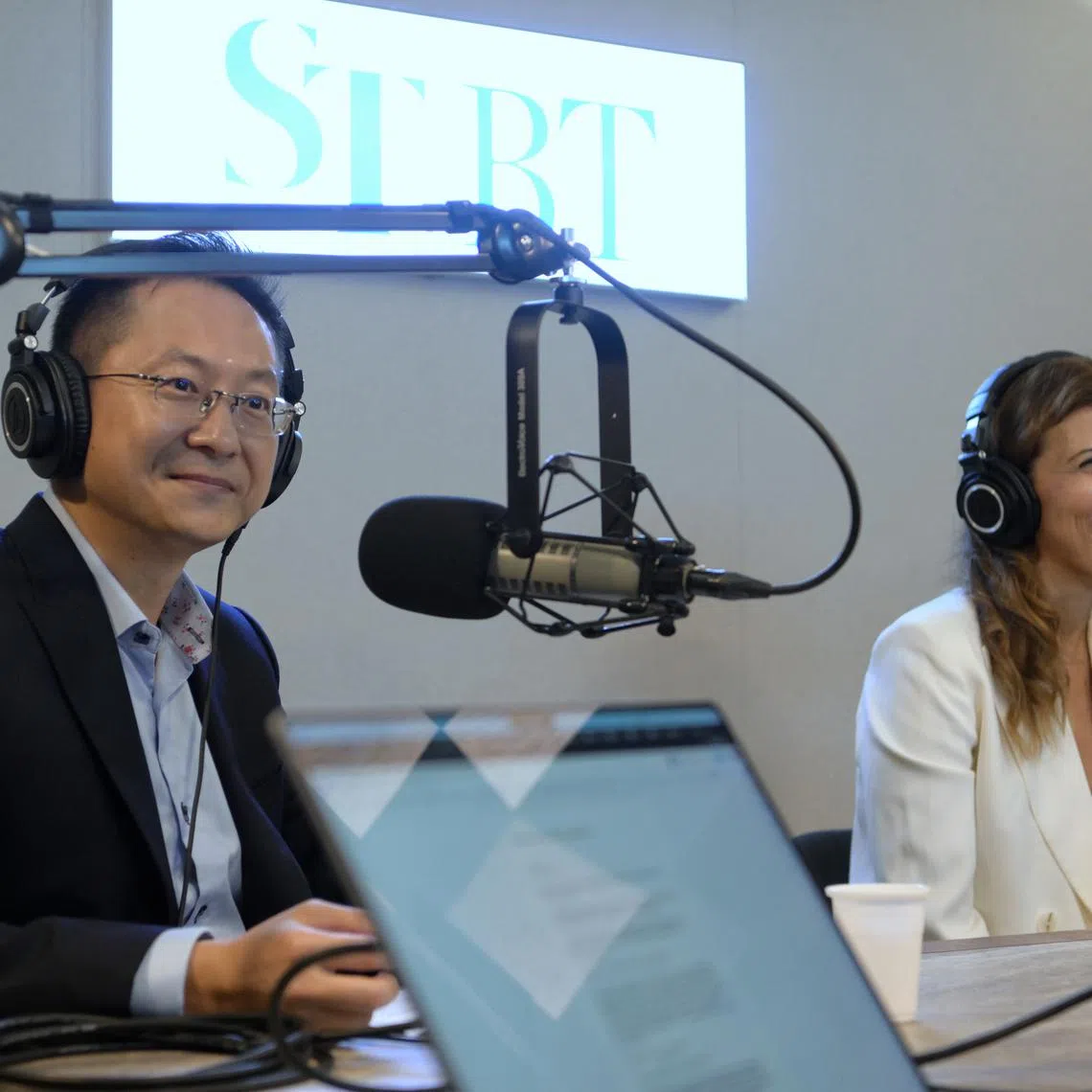 Mr Aaron Chwee, head of wealth advisory at OCBC (left), and professor of marketing at ESSEC Business School, Professor Sonja Prokopec (right) in the ST podcast studio.