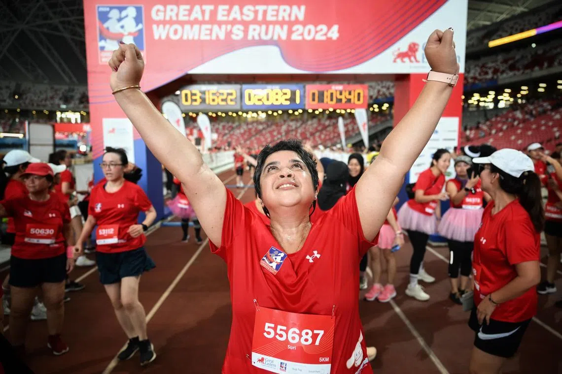 Aparna Suri celebrates after completing her 5km race at the Great Eastern Women?s Run on Oct 27, 2024.