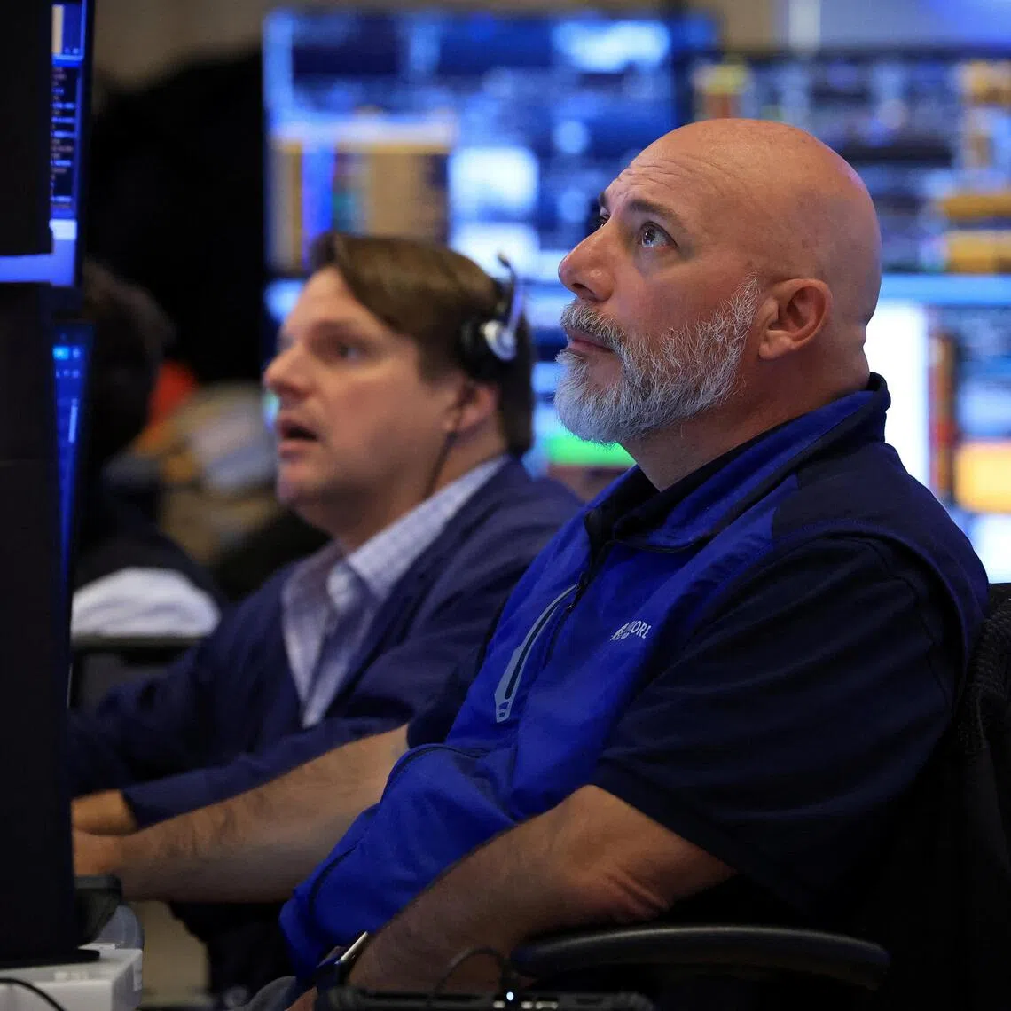 Traders working on the floor of the New York Stock Exchange, in New York City, on Aug 24.