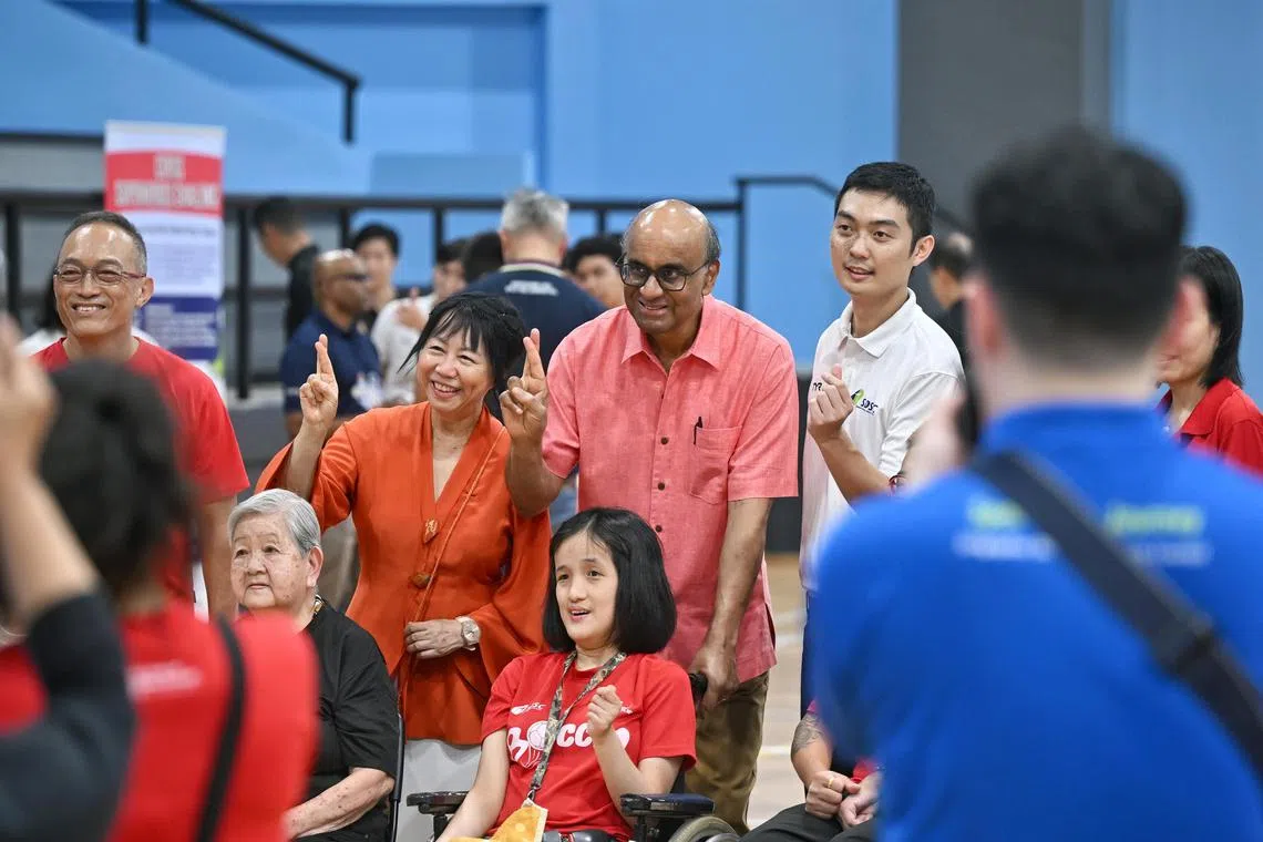 President Tharman Shanmugaratnam with his wife Ms Jane Yumiko Ittogi, taking a group picture with Boccia players at Delta Sports Centre on Sep 4, 2024.