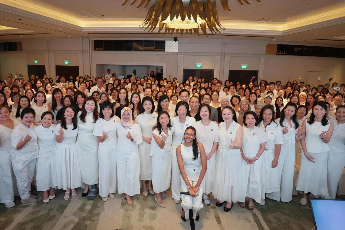Attendees in a group photo during the PAP Women’s Wing Conference 2026 Women Empowered at Mandarin Oriental Singapore on Sept 26.